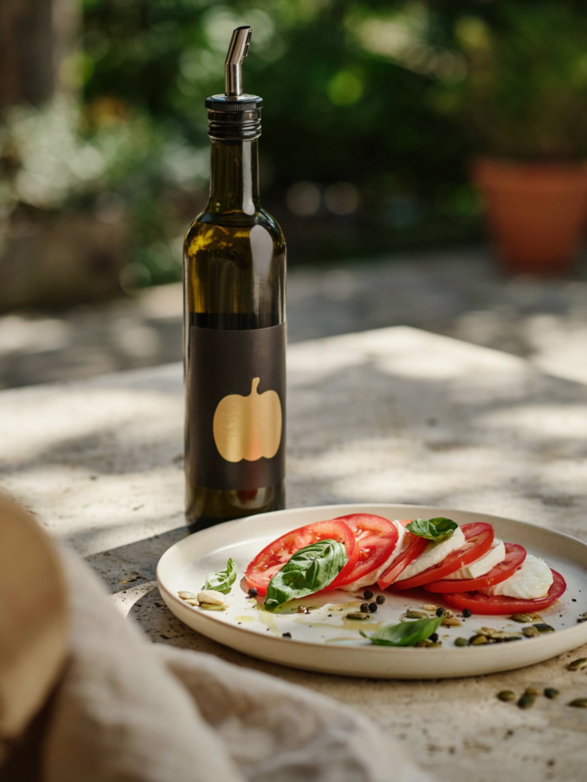 Tomate e Mozzarella com Óleo de Abóbora